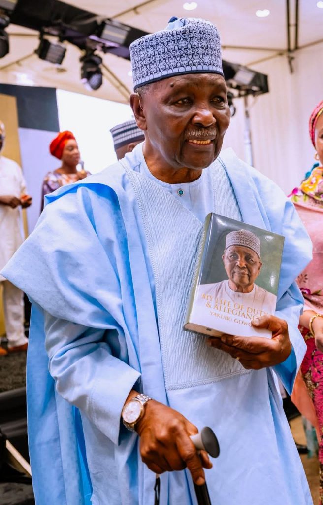FB_IMG_1779214045405-656x1024 Gowon’s Emotional Return to History: Shettima, Jonathan, Kukah, Sanusi, Sultan Lead Powerful Gathering at Abuja Book Launch.